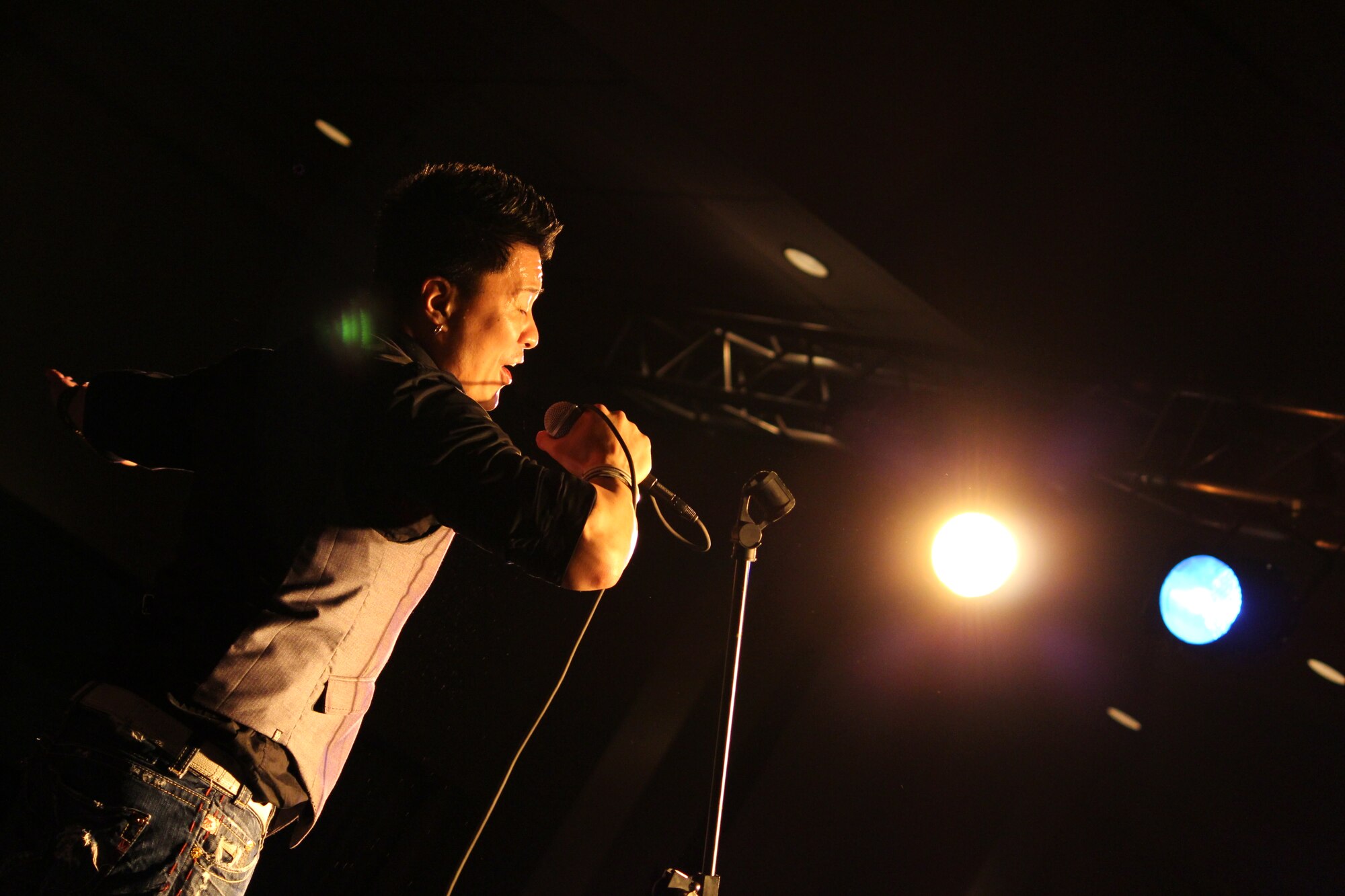 Joe Henry, lead singer for Adam's Attic, an alternative pop/rock band, performs for military members and their families during a concert Jan. 17, 2013, at Incirlik Air Base, Turkey. The band did a 13-day, Armed Forces Entertainment tour through Turkey and Egypt. (U.S. Air Force photo by Staff Sgt. Peter Ising/Released)