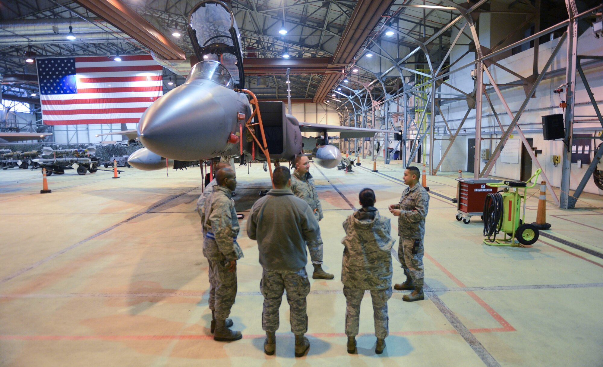 ROYAL AIR FORCE LAKENHEATH, England - Tech. Sgt. Ruben TrejoSanchez, 493rd Aircraft Maintenance Unit NCO in charge of maintenance and native of Rapid City, S.D., talks to Maintainer for a Day participants about different aspects of maintenance Jan. 18, 2013. Throughout the event, participants were given insight into F-15C Eagle, F-15E Strike Eagle and HH-60G Pave Hawk maintenance. (U.S. Air Force photo by Staff Sgt. Stephen Linch)