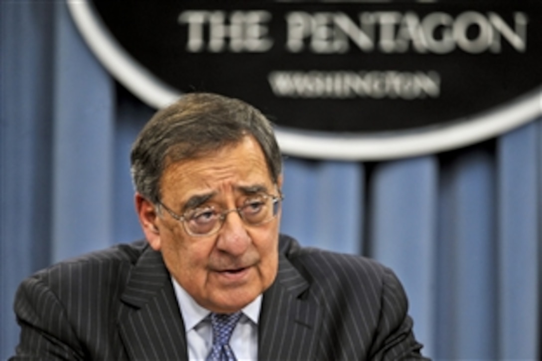 Defense Secretary Leon E. Panetta addresses reporters at the Pentagon, Jan. 24, 2013, after announcing the lifting of the ban on women from serving in military combat roles. 