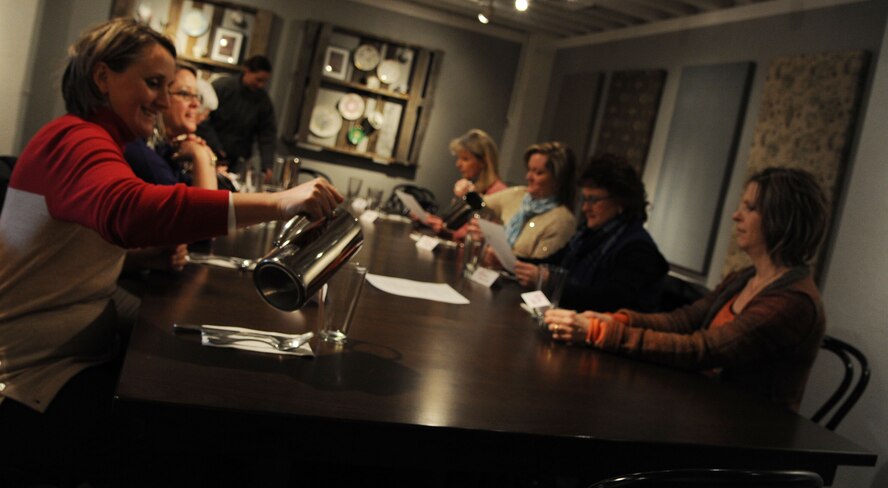 MINOT, N.D. -- The 5th Bomb Wing and the 91st Missile Wing key spouses down for lunch with Melody Carey, spouse of Maj. Gen. Michael Carey, 20th Air Force commander and Pat Nordel, spouse of Chief Master Sgt. David Nordel, 20th AF command chief here, Jan. 24. Twentieth Air Force is responsible for maintaining and operating the Air Force's ICBM force. Designated as U.S. Strategic Command's Task Force 214, 20th AF provides on-alert, combat ready ICBMs to the President of the United States.(U.S. Air Force photo/Senior Airman Brittany Y. Auld)