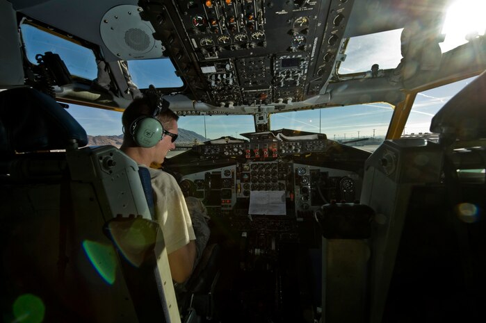 Senior Airman Justin Sobie, 22nd Aircraft Maintenance Squadron crew chief, watches the fuel gauges as the KC-135 Stratotanker gets refueled after participating in a mission during Red Flag 13-2 Jan. 22, 2013, at Nellis Air Force Base, Nev. The Stratotaker needs the proper amount of fuel in each tank to ensure the proper distribution of fuel to the jets coming to receive fuel during a mission. (U.S. Air Force Photo by Senior Airman Daniel Hughes)