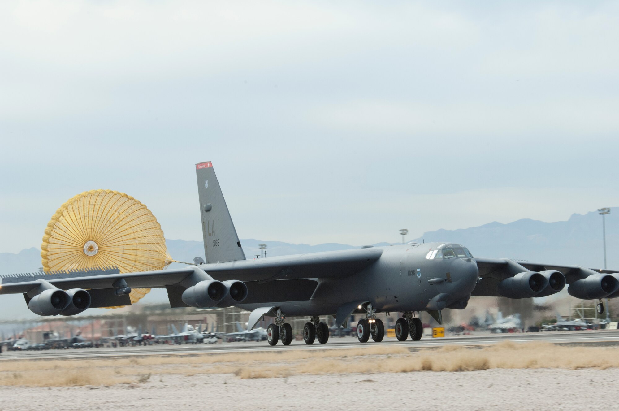 A B-52 Stratofortress from Barksdale Air Force Base, La., deploys its parachute as it lands at Nellis Air Force Base, Nev., during Red Flag 13-2 Jan. 24, 2013. Red Flag is a realistic combat training exercise involving the air forces of the United States and its allies. (U.S. Air Force photo by Caitlin Kenney)