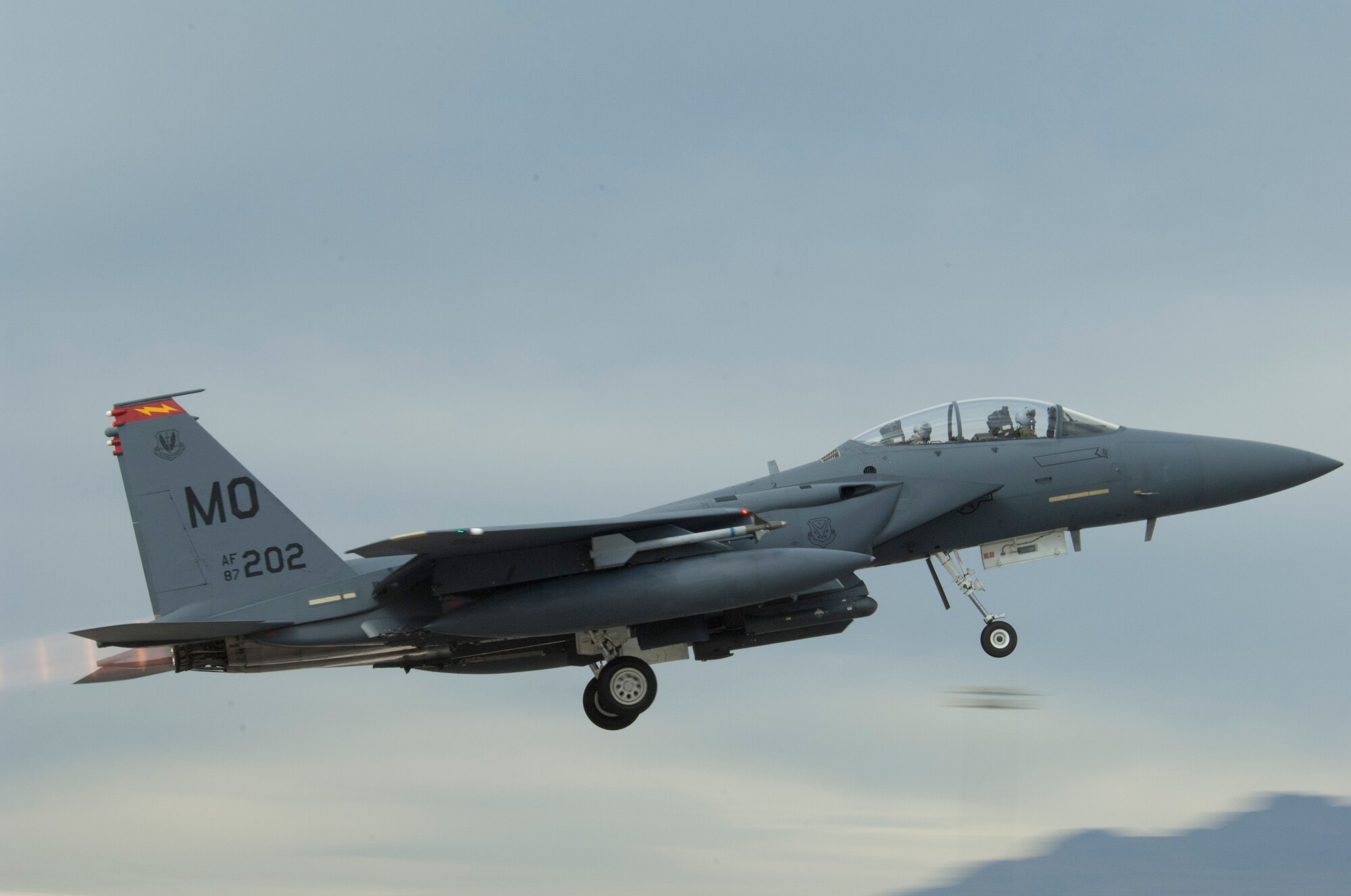 An F-15E from Mountain Home Air Force Base, Idaho, takes off from Nellis Air Force Base, Nev., during Red Flag 13-2 Jan. 24, 2013. Units from the around the country and the world have come to Nellis to work together on simulated combat scenarios to prepare them for future real-world contingencies. (U.S. Air Force photo by Caitlin Kenney)