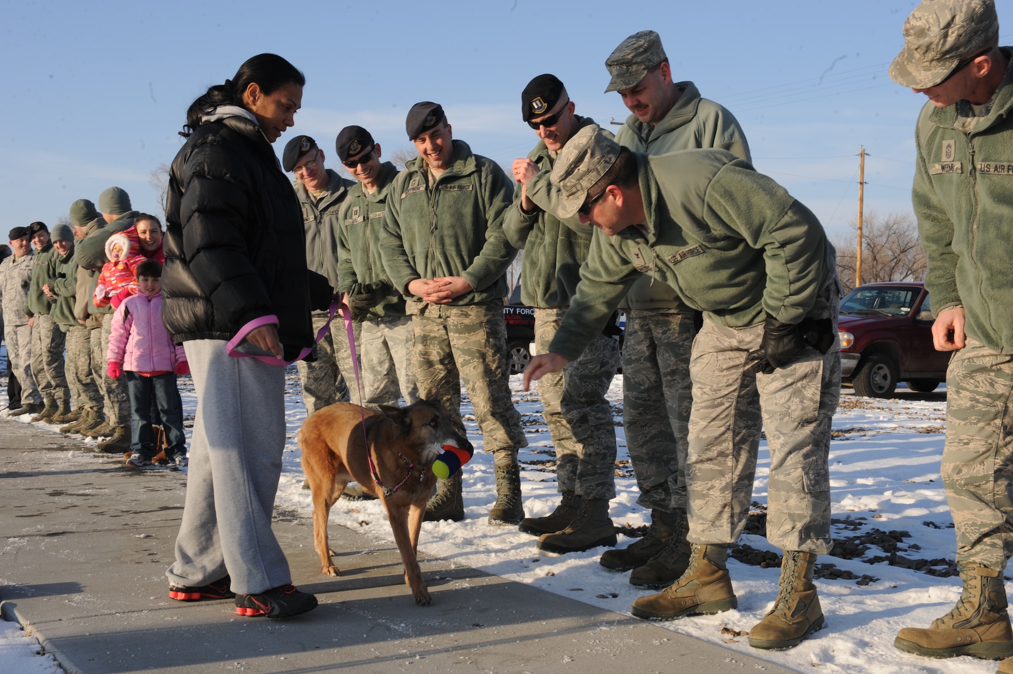 Base leadership, fellow Defenders and other members of the Gunfighter family came out to say farewell to Tanja as she left the 366th Security Forces Squadron kennels Jan. 18, 2013. For a few weeks in January Tanja held the distinction as the longest-serving military working dog in the Department of Defense. (U.S. Air Force photo/Senior Airman Benjamin Sutton)