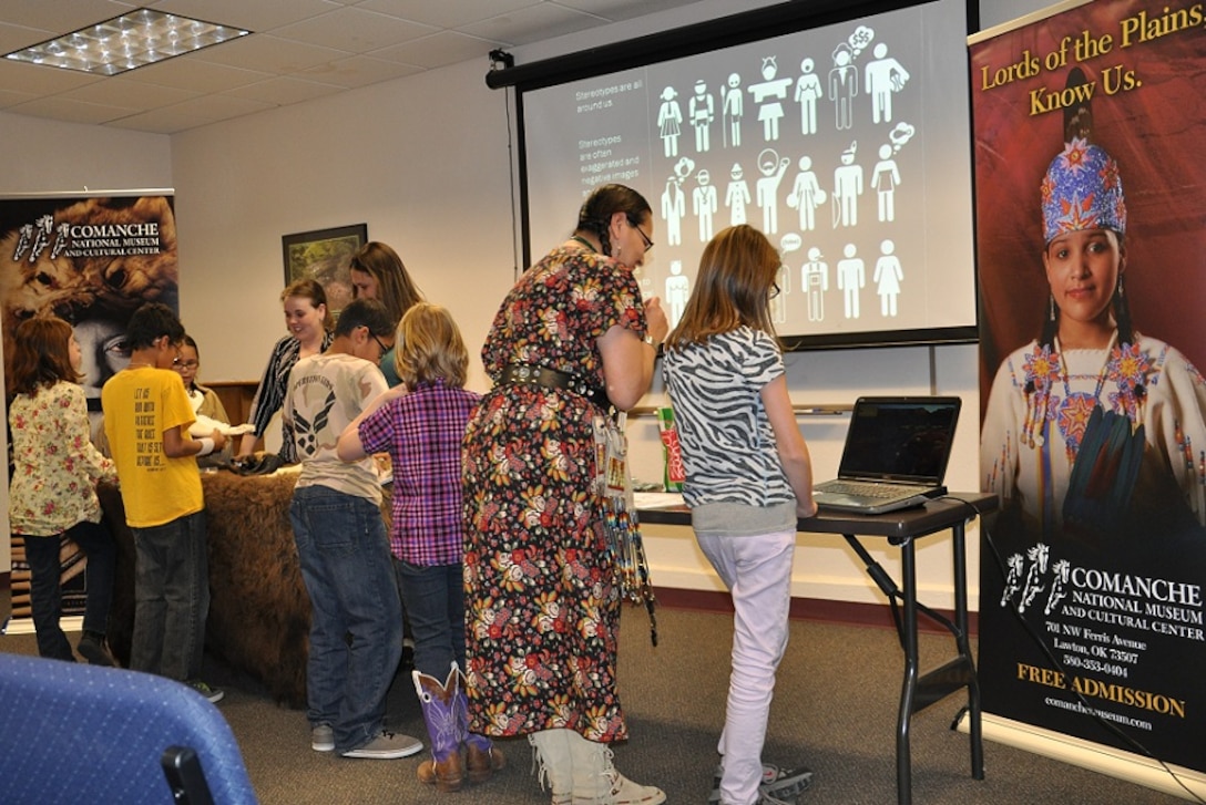 The Sheppard Air Force Base Airmen and Family Readiness Center sponsored a
Comanche Tribal presentation from the Comanche Nation Cultural Center in
Lawton, Okla. Jan 24, 2013. Tina Emhoolah was excited to share her Native
American heritage and artifacts with a military audience as she herself grew
up as an "Army brat" and married a Marine Corps soldier. The Comanche tribe
is one of 566 federally recognized tribal groups in the nation and one of
seven in the southwestern Okla. Region.  (U.S. Air Force Photo/Debi Smith)

