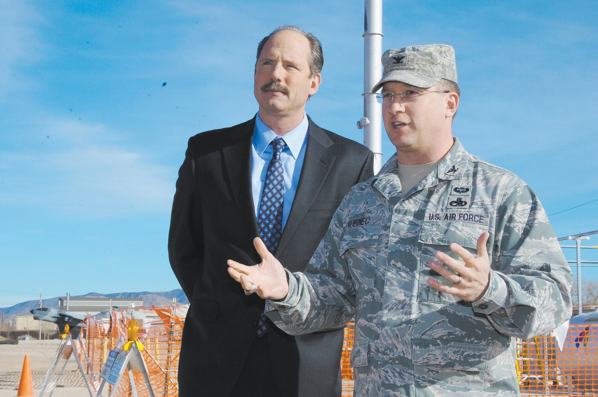 Col. John Kubinec, installation commander at Kirtland AFB, right, conducted a tour for Albuquerque Mayor Richard J. Berry of the newly upgraded fuel plume remediation equipment Jan. 23 at the base’s bulk fuel facility site. The new system, called a “soil vapor extraction catalytic oxidizer,” will allow for more efficient and effective remediation. The technology has been used successfully at other fuel spill sites across the nation, including New Mexico. 