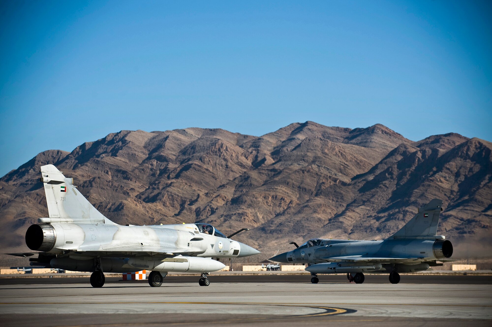 United Arab Emirates Air Force Mirage 2000-9s prepare to depart for a training mission during Red Flag 13-2, Jan. 22, 2013, at Nellis Air Force Base, Nev. The UAE Air Force is participating in RED FLAG 13-2 to maximize air combat readiness in a realistic training environment. (U.S. Air Force photo/Senior Airman Brett Clashman)
