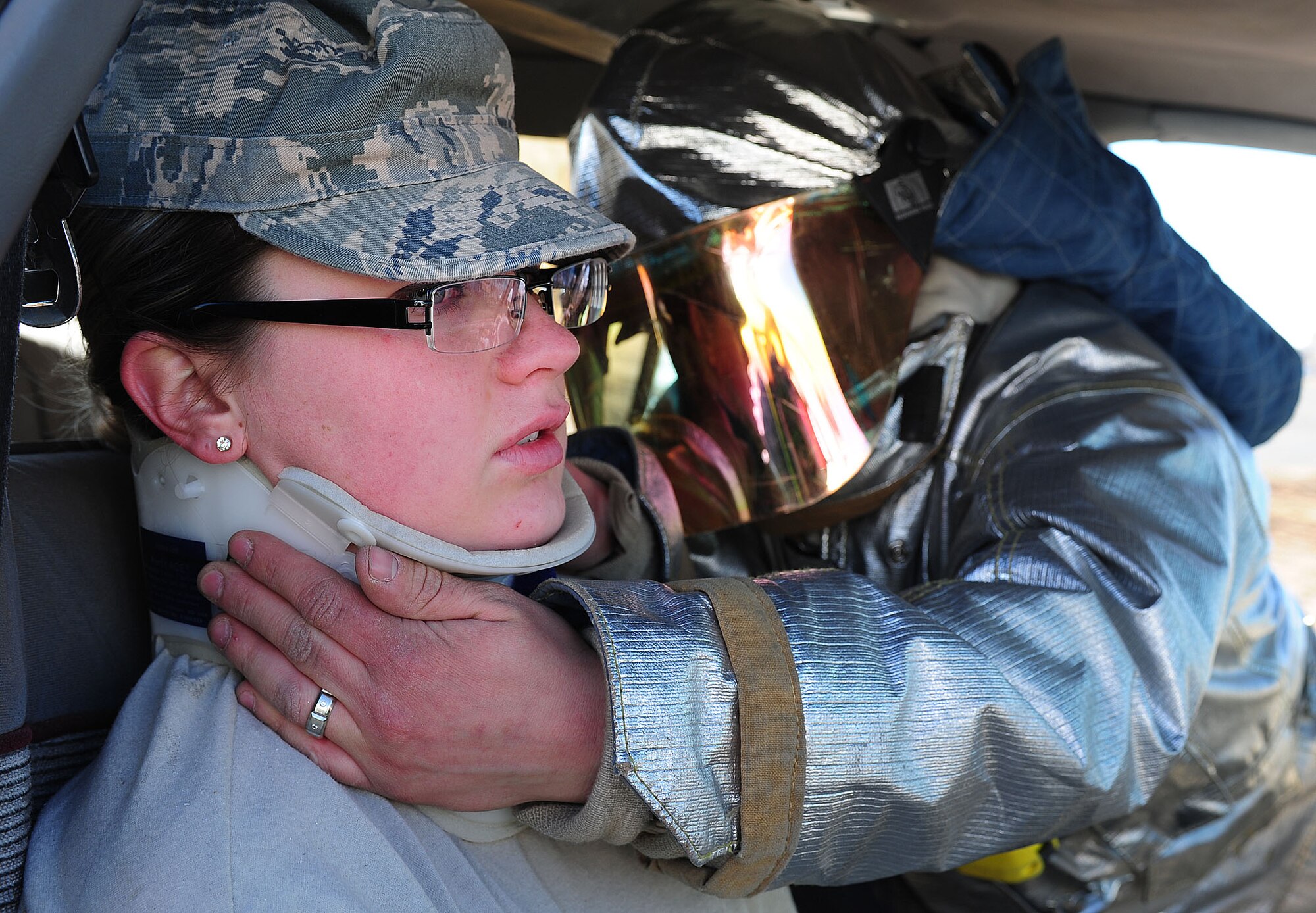 A participant receives treatment for a simulated injury during an exercise at Cannon Air Force Base, N.M., Jan. 24, 2013. Base emergency responders participate frequently in exercises in order to prepare themselves for real world events. (U.S. Air Force photo/Airman 1st Class Ericka Engblom)