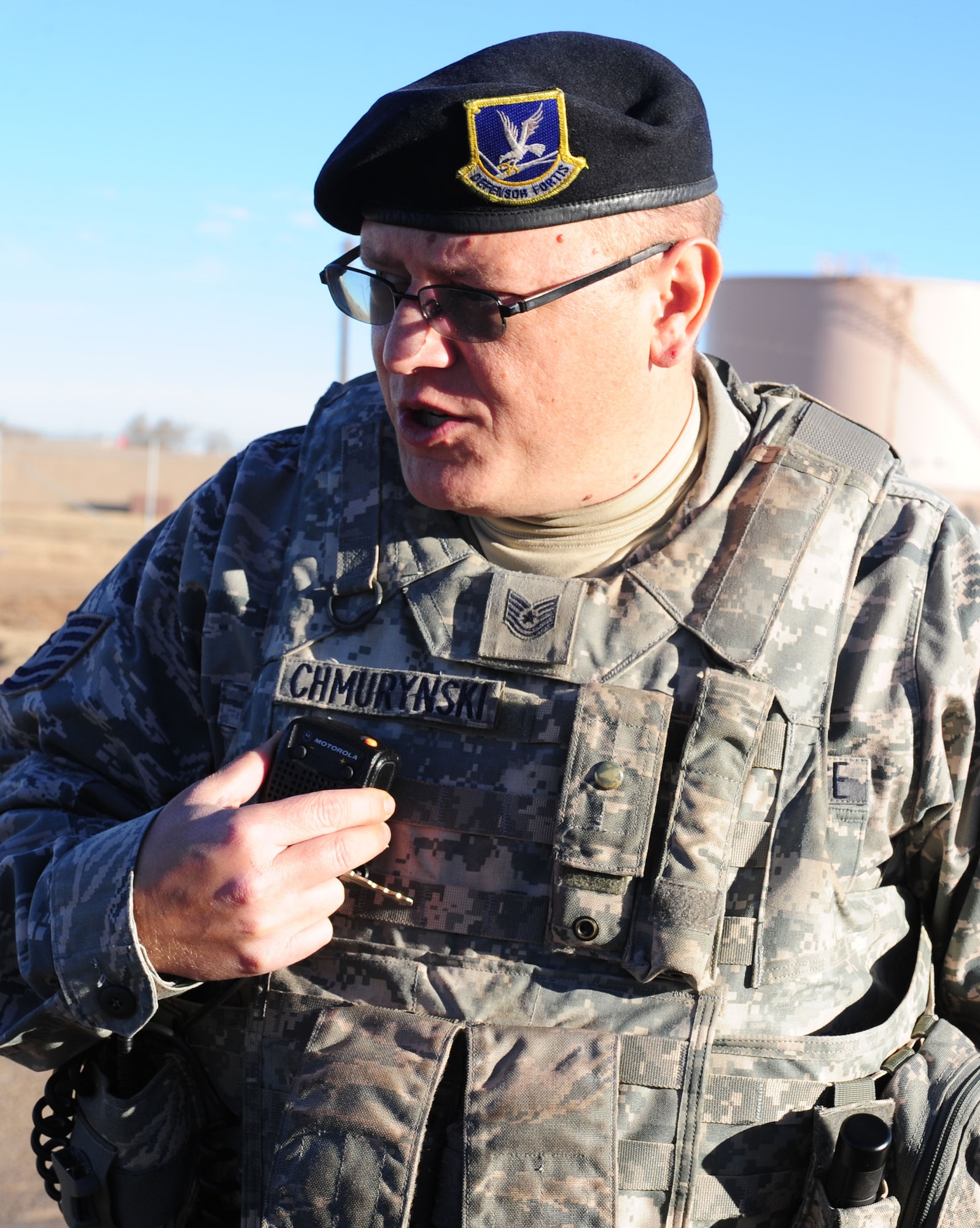 U.S. Air Force Tech. Sgt. Theodore Chmurynski, 27th Special Operations Security Forces Squadron, calls in a simulated accident during an exercise at Cannon Air Force Base, N.M., Jan. 24, 2013. Base Emergency responders participate frequently in exercises in order to prepare themselves for real world events. (U.S. Air Force photo/Airman 1st Class Ericka Engblom)
