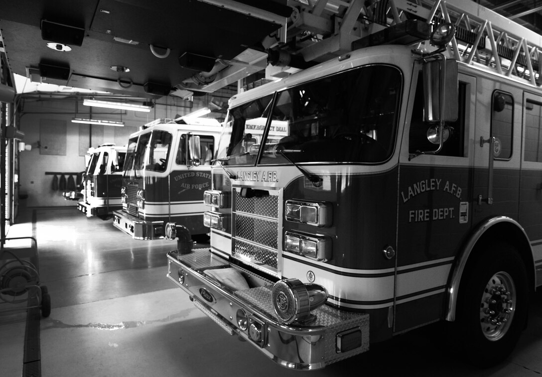 Alert vehicles are ready to respond to an emergency at the fire department on Langley Air Force Base, Va., Jan. 15, 2013. Personnel at the fire department have 60 seconds to board an alert vehicle, and five minutes to respond on-scene to an incident after receiving an alarm. (U.S. Air Force photo by Staff Sgt. Jeff Nevison/Released)