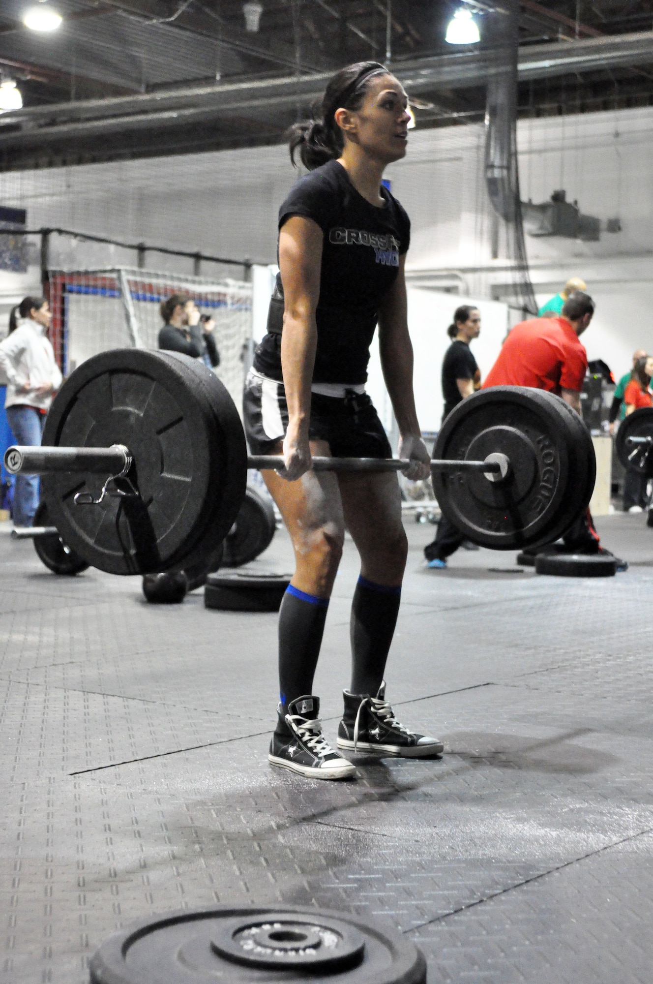 CrossFit Hydro’s Ashley Riddle deadlifts 135 pounds 45 times during heat three of workout of the day two. (U.S. Air Force Photo by 2nd Lt. Carly Costello/Released)
