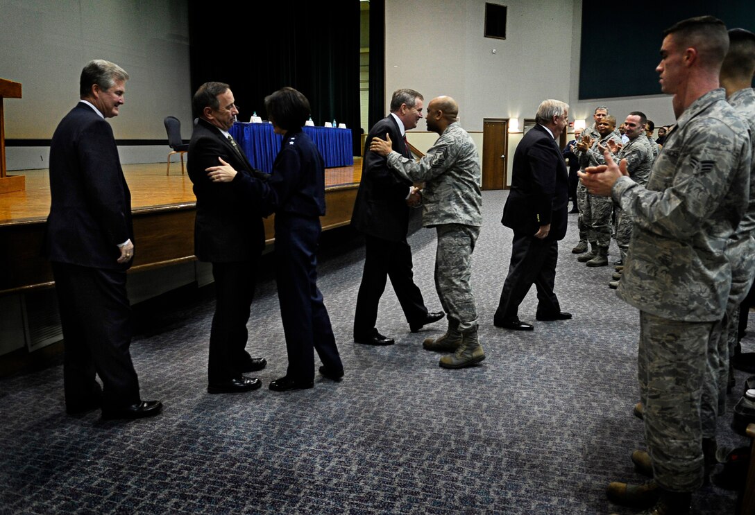 Six former Chief Master Sergeants of the Air Force receive a standing ovation after speaking to Airmen at Joint Base Andrews, Md., during an all call, Jan. 24, 2013. The CMSAFs spoke to Airmen about upholding core values, their trials during their tenure and even gave the Airmen a chance to ask candid questions. (U.S. Air Force photo/Senior Airman Lauren Main)