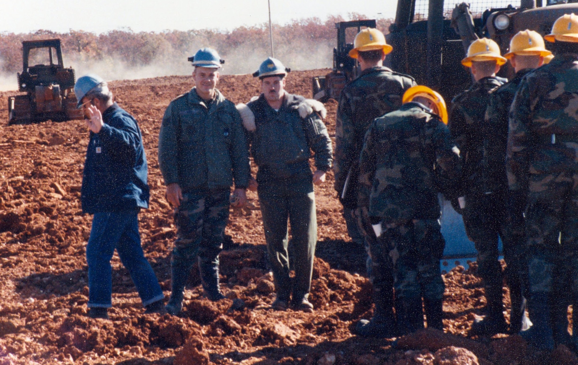 Tech. Sgt. James Roy (center, left) poses with a fellow instructor Tech. Sgt. Lance Davis, (right) at Ft. Leonard Wood, Mo., during the dozer phase class for training heavy equipment operators. Roy served with the 3770th Technical Training Group from January 1988 to May 1992. (courtesy photo)