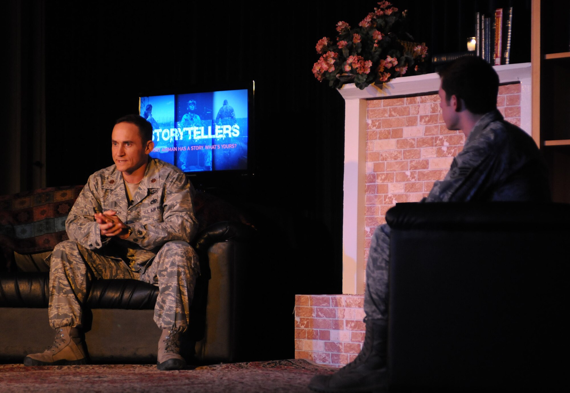 Senior Airman Jason Rimer, right, 39th Contracting Squadron contract specialist, interviews Maj. James Gherdovich, 39th Logistics Readiness Squadron commander, left, during Storytellers II Jan. 19, 2013, at Incirlik Air Base, Turkey.  Gherdovich spoke about uncovering the remains of a service member who died in the Vietnam War while assigned to the Joint Prisoner of War/Missing in Action Accounting Command at Joint Base Pearl Harbor-Hickam, Hawaii. (U.S. Air Force photo by Senior Airman Anthony Sanchelli/Released)

