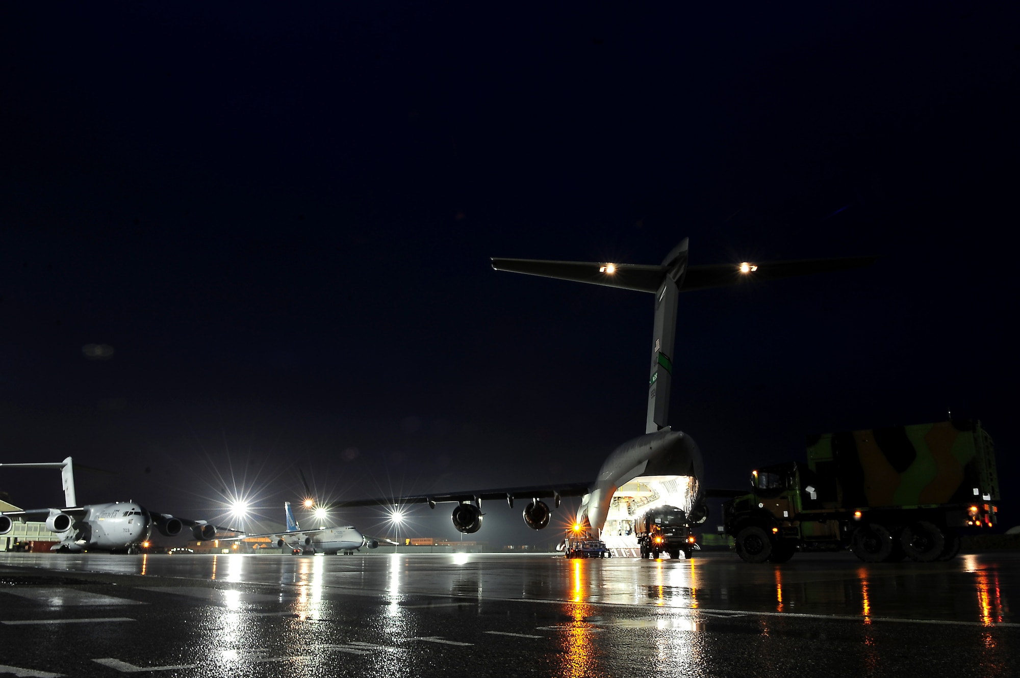 ISTRES, France -- French soldiers load a U.S. Air Force C-17 Globemaster III here Jan. 23, 2013, as they prepare to fly to Mali to fight off Islamic extremists that have taken control of a large part of northern Mali.  The United States has agreed to help France airlift troops and equipment into Mali. (U.S. Air Force photo by Senior Airman James Richardson)(Released)