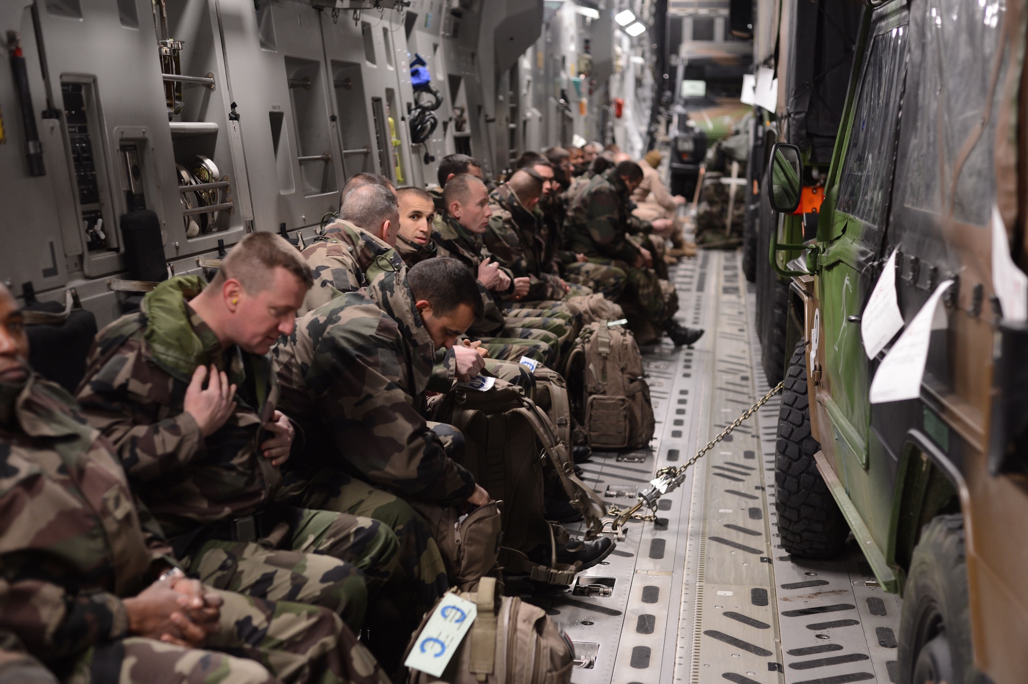 ISTRES, France – French troops prepare for take-off inside a U.S. Air Force C-17 Globemaster III cargo aircraft in Istres, France, Jan. 21, 2013. France deployed military to the African country of Mali to fight forces who threaten the current Mali government's stability and are relying on assistance from allies in transporting troops and supplies. (U.S. Air Force photo by Staff Sgt. Nathanael Callon/Released)