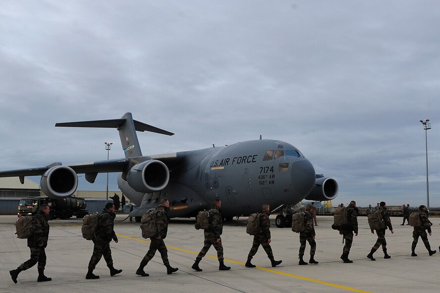 French soldiers march to a U.S. Air Force C-17 Globemaster III in Istres, France Jan. 21, 2013 in support of missions in the Republic of Mali. The United States has agreed to help France airlift troops and equipment into Mali. (U.S. Air Force photo/Senior Airman James Richardson)