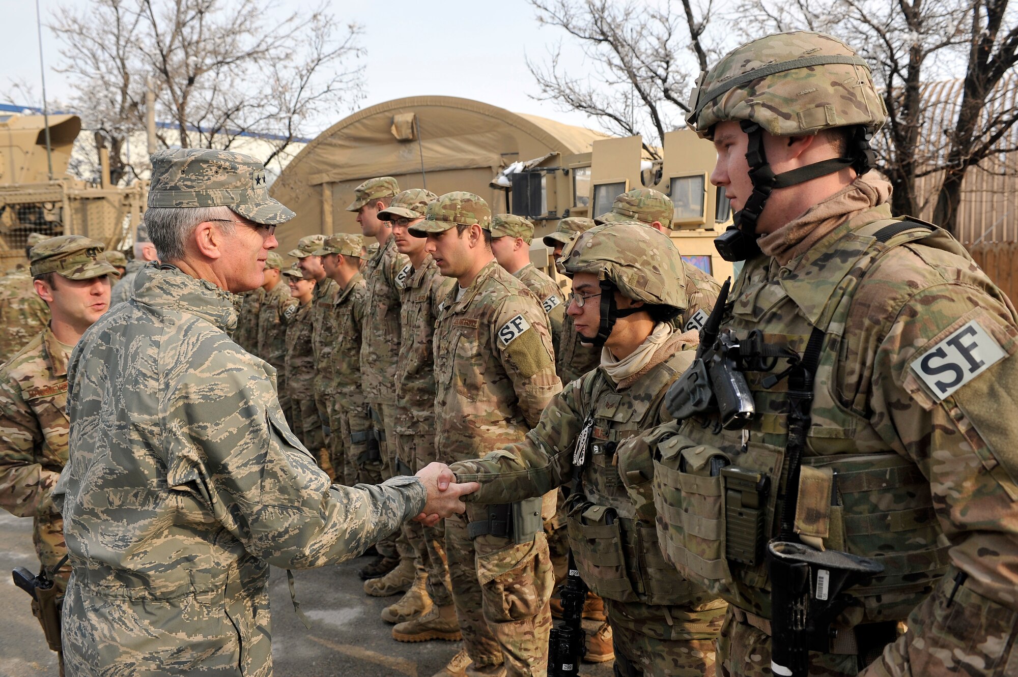 Gen. Paul J. Selva, Air Mobility Command commander, meets with members of the 455th Air Expeditionary Wing at Bagram Airfield, Afghanistan Jan. 17, 2013. Airmen were able to talk with Selva and highlight what they and their unit bring to the BAF mission. (U.S. Air Force photo/Senior Airman Chris Willis/Released)