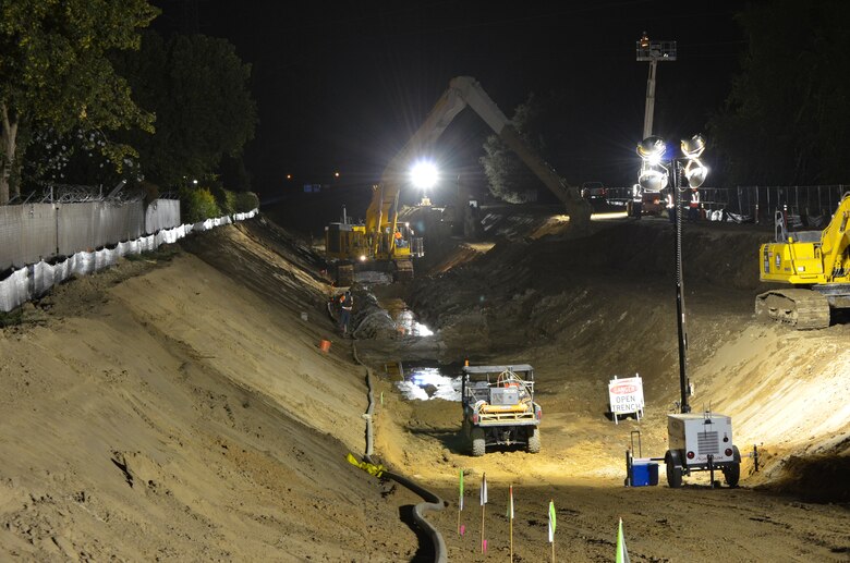 Construction crews work in darkness--when energy demand is lowest--on a stretch of American River levee near the California State University-Sacramento campus Sept. 12, 2012 to close a 900-foot-long gap in a seepage cutoff wall underneath high power lines. 
The Corps has built more than 20 miles of seepage walls into American River levees since 2000. Areas where construction was complicated by utilities, bridges or power lines were set aside for later construction.
The project is part of the American River Common Features project, a joint flood risk reduction effort between the Corps, the state’s Central Valley Flood Protection Board/Department of Water Resources and the Sacramento Area Flood Control Agency.