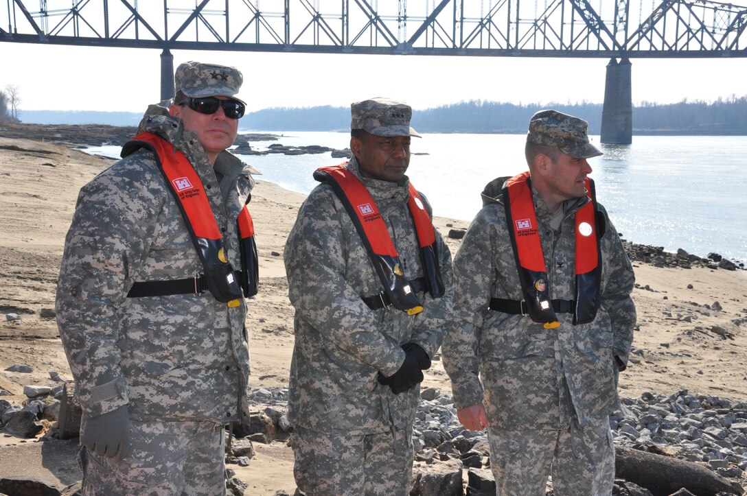 The USACE Chief of Engineers, Lt. Gen. Thomas P. Bostick (center), joined Mississippi Valley Division Commander, John W. Peabody (left), and St. Louis District Commander, Chris Hall (right), in Thebes, Ill. on January 6 to inspect the rock removal work that will deepen the river by up to two feet and aid navigation on the Middle Mississippi River.