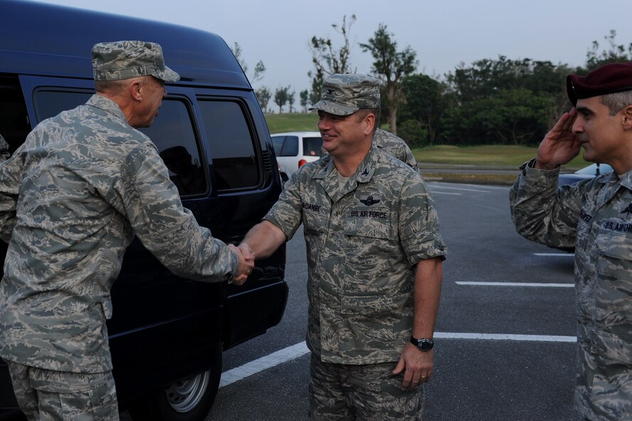 U.S. Air Force Chaplain (Maj. Gen.) Howard Stendahl, Air Force Chief of Chaplains, shakes hands with Col. Brian McDaniel, 18th Wing vice commander, at the 18th Wing Headquarters Bldg. on Kadena Air Base, Japan, Jan. 24, 2013. Stendahl visited Kadena on a pastoral visit to boost Airmen morale by joining the 18th Civil Engineer Squadron for an Explosive Ordinance Disposal demonstration and the 18th Maintenance Group. He also spent an evening touring chapel-ran facilities. (U.S. Air Force photo/Airman 1st Class Hailey R. Davis)