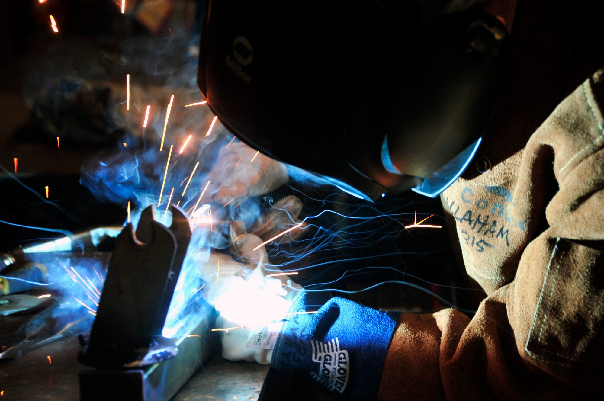Senior Airman Jared Callaham, 51st Maintenance Squadron aircraft metals technology journeyman, welds two parts together at Osan Air Base, Republic of Korea, Jan. 23, 2013. Technicians must pass welding tests in their shop before getting qualified to work on aircraft. (U.S. Air Force photo/Airman 1st Class Alexis Siekert)