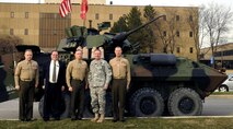 Brigadier General Frank Kelley, Commander, Marine Corps Systems Command (center) visited Light Armored Vehicle and Robotic Systems sites Jan. 15 in Warren, Mich. Also pictured from left are Colonel Mark Brinkman, Program Manager LAV; Michael Viggato, Deputy to the Commander, U.S. Army TACOM Life Cycle Management Command; Army Major General Michael Terry, Commanding General, USATACOM LCMC; and Chief Warrant Officer 5 James Steiner, PM LAV. (PM LAV photo)