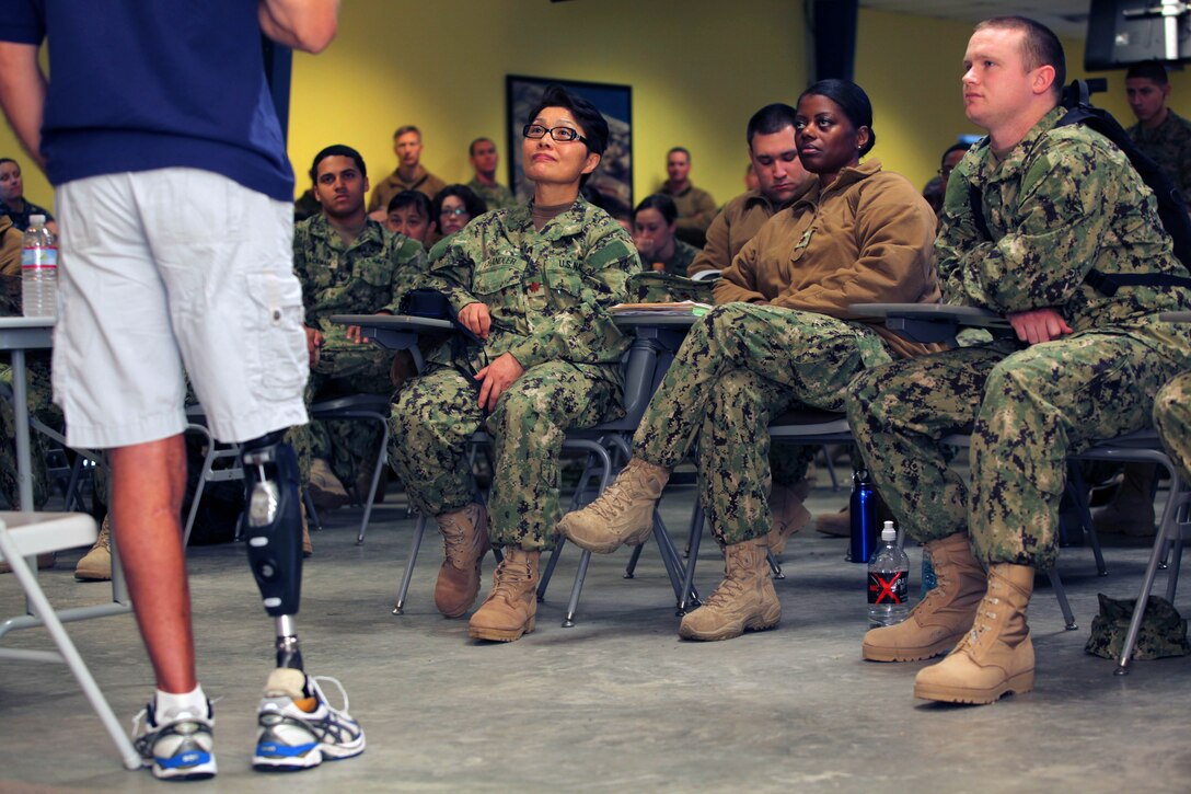 Deploying sailors actively listen as wound warrior Sgt. Maj. Patrick Wilkinson, formerly  2nd Battalion, 3rd Marine Regiment Battalion Sergeant Major, shares his story during a pre-deployment at the Naval Expeditionary Medical Training Institute here Jan. 24.