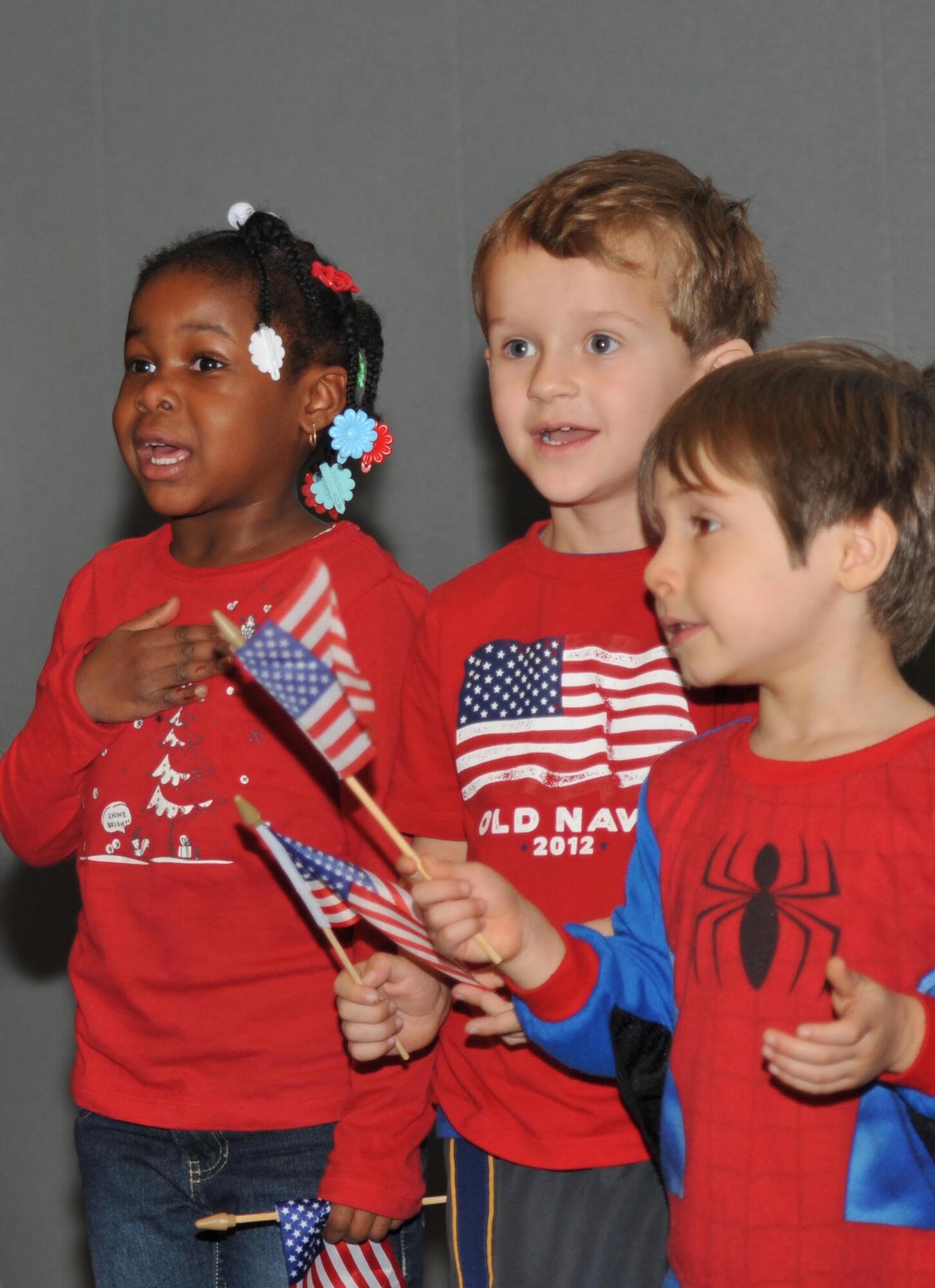 Children from the Los Angeles AFB Child Development Center sing the National Anthem during the Welcome Home Airmen ceremony, Jan. 24.  (Photo by Sarah Corrice)