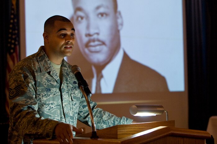 Tech. Sgt. Daniel Cain, 57th Maintenance Squadron assistant NCO in charge of the precision guided munitions element, speaks at the Martin Luther King Jr. observance ceremony Jan. 25, 2013, at the chapel. Martin Luther King, Jr. was an American clergyman, activist, and leader in the African-American civil rights movement. (U.S. Air Force photo by Senior Airman Matthew Lancaster)