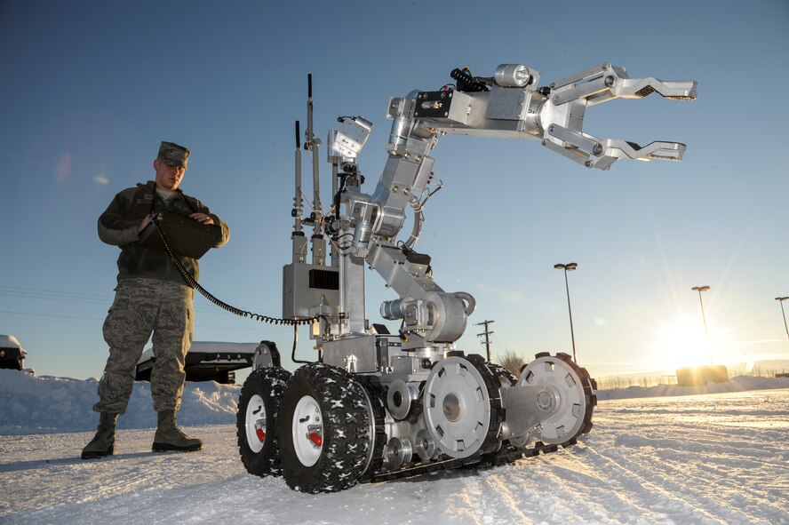 U.S. Air Force Airman 1st Class Kyle Fletcher, 354th Civil Engineer Squadron explosive ordinance disposal apprentice, maneuvers an F6A robot Jan. 22, 2013, Eielson Air Force Base, Alaska.  The F6A is a remote controlled platform which allows EOD members to safely investigate suspected explosive threats.  (U.S. Air Force Photo/Airman 1st Class Peter Reft)