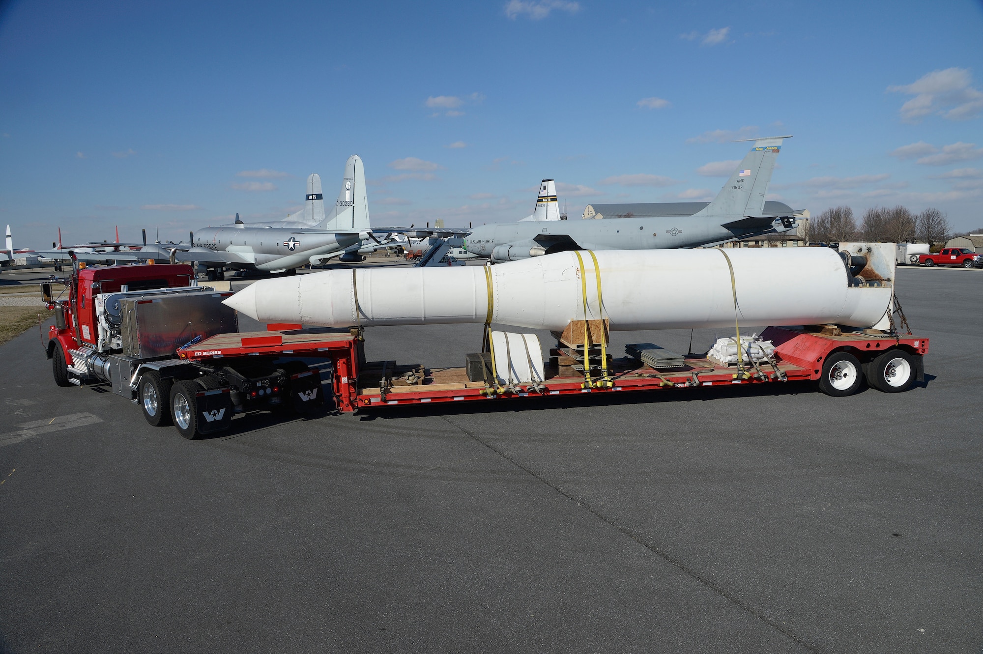 A Minuteman Intercontinental Ballistic Missile (ICBM) is delivered to the Air Mobility Command museum at Dover Air Force Base, Del. on Jan. 23rd, 2013. The inert ICBM has been moved here from its previous display location to help showcase one of the famous missions flown by the C-5A Galaxy. During this famous mission conducted on Oct. 24, 1974, C-5A serial #69-0014 air-dropped an ICMB missile at altitude which successfully fired after stabilizing during a feasibility test program. The ICBM will be restored and displayed next to C-5A 69-0014 in the near future. The museum is scheduled to receive C-5A 69-0014 in March 2013. USAF photo/Greg L. Davis 