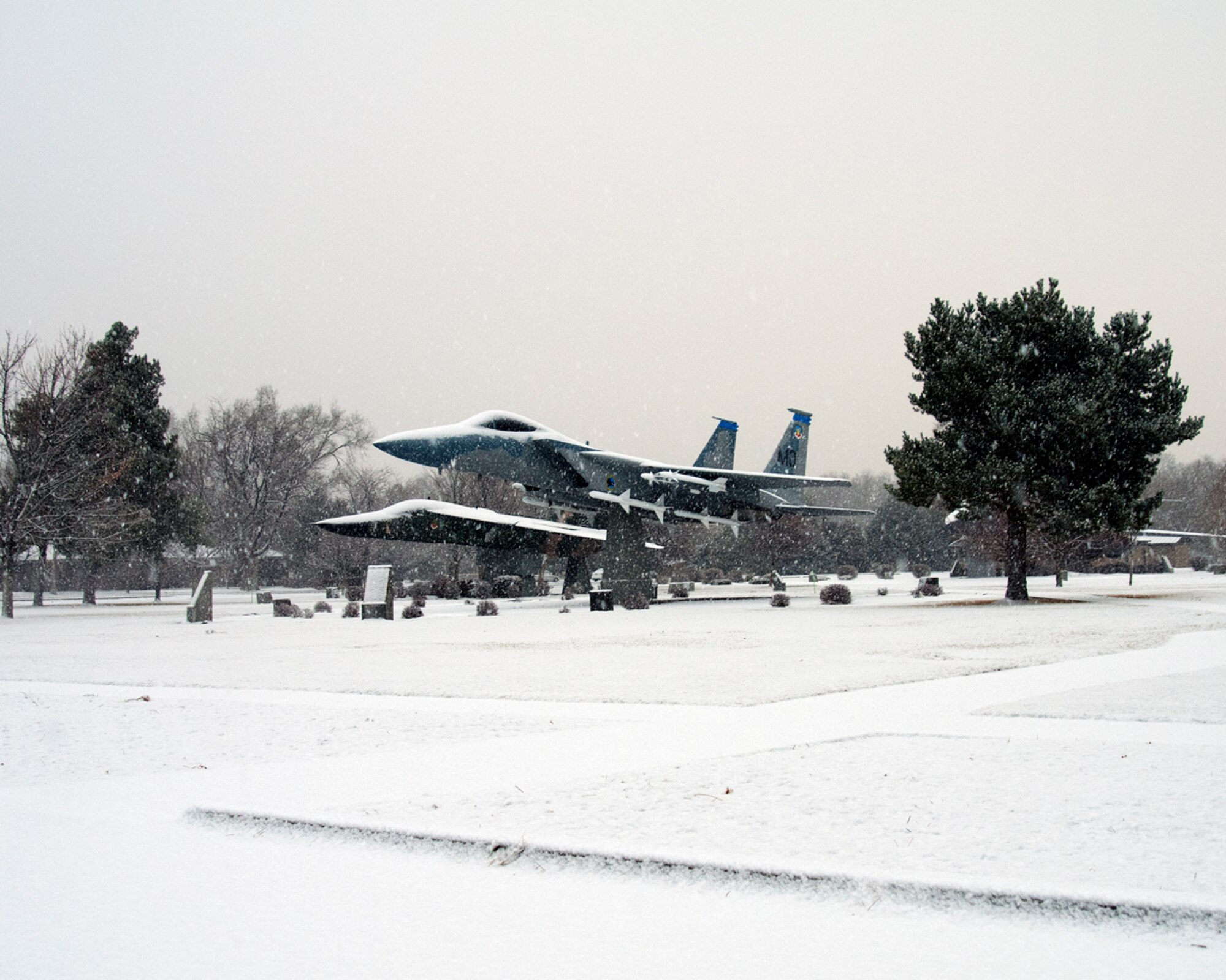 Snow blankets static aircraft on display at Mountain Home Air Force Base, Idaho, Jan. 28, 2013. A readiness exercise was paused and later cancelled on the base Jan. 10, and winter weather has not let up. (U.S. Air Force photo/Master Sgt. Kevin Wallace/RELEASED)