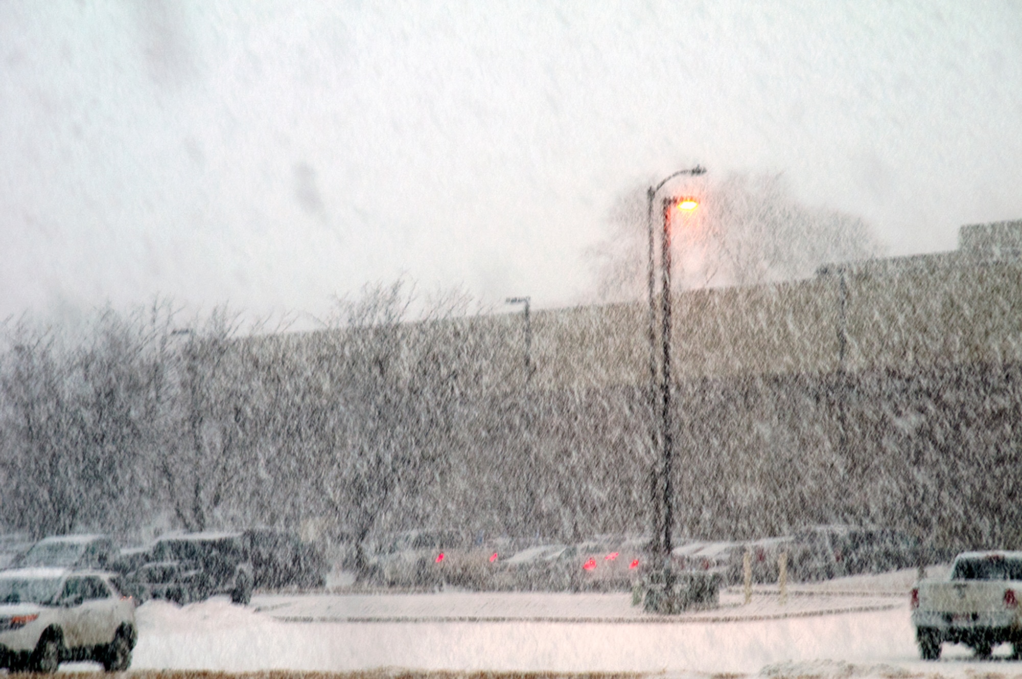 Snow blankets the headquarters building at Mountain Home Air Force Base, Idaho, Jan. 28, 2013. A readiness exercise was paused and later cancelled on the base earlier in the month, and winter weather has not let up. (U.S. Air Force photo/Master Sgt. Kevin Wallace/RELEASED)