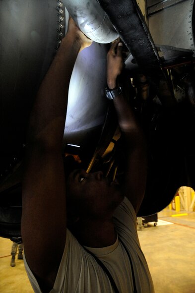 Airman 1st Class Kiron St. Laurent, 2nd Maintenance Squadron accessories flight, checks the Y-duct on the engine of a B-52H Stratofortress during a phase inspection on Barksdale Air Force Base, La., Jan. 28. The Y-duct draws in air as the aircraft flies and uses the air to run the air conditioning, regulate cabin pressure and provide a source of air for aircrew. (U.S. Air Force photo/Airman 1st Class Andrew Moua)