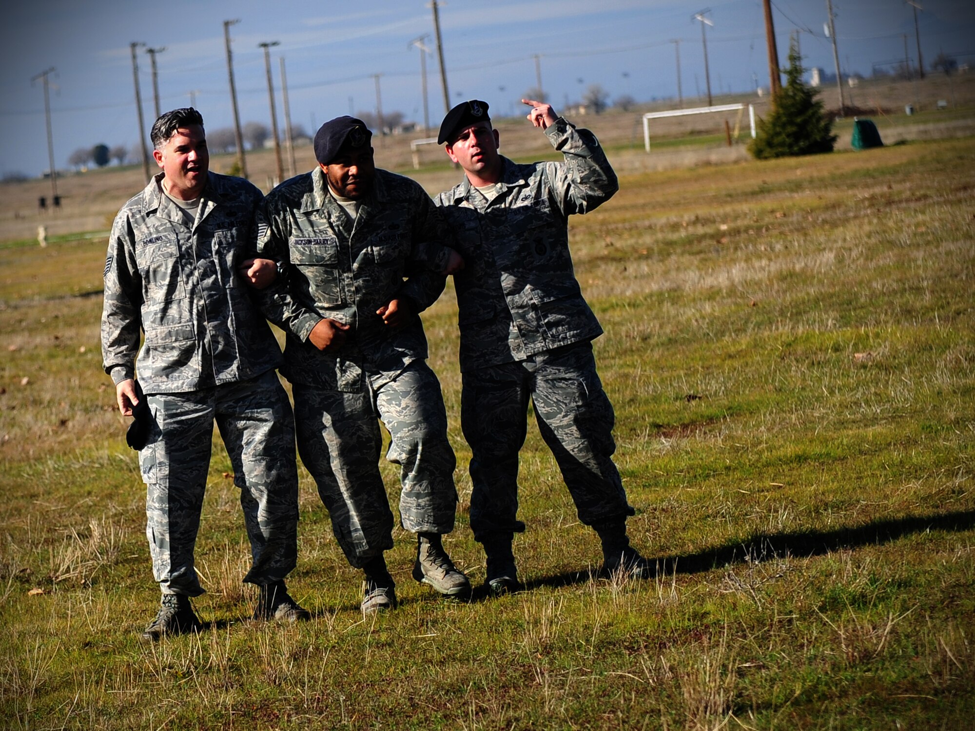 Trainers from the 9th Security Forces Squadron pretend to form a protest line during civil disturbance training at Beale Air Force Base, Calif., Jan. 25, 2013. (U.S. Air Force photo by Senior Airman Shawn Nickel/Released)