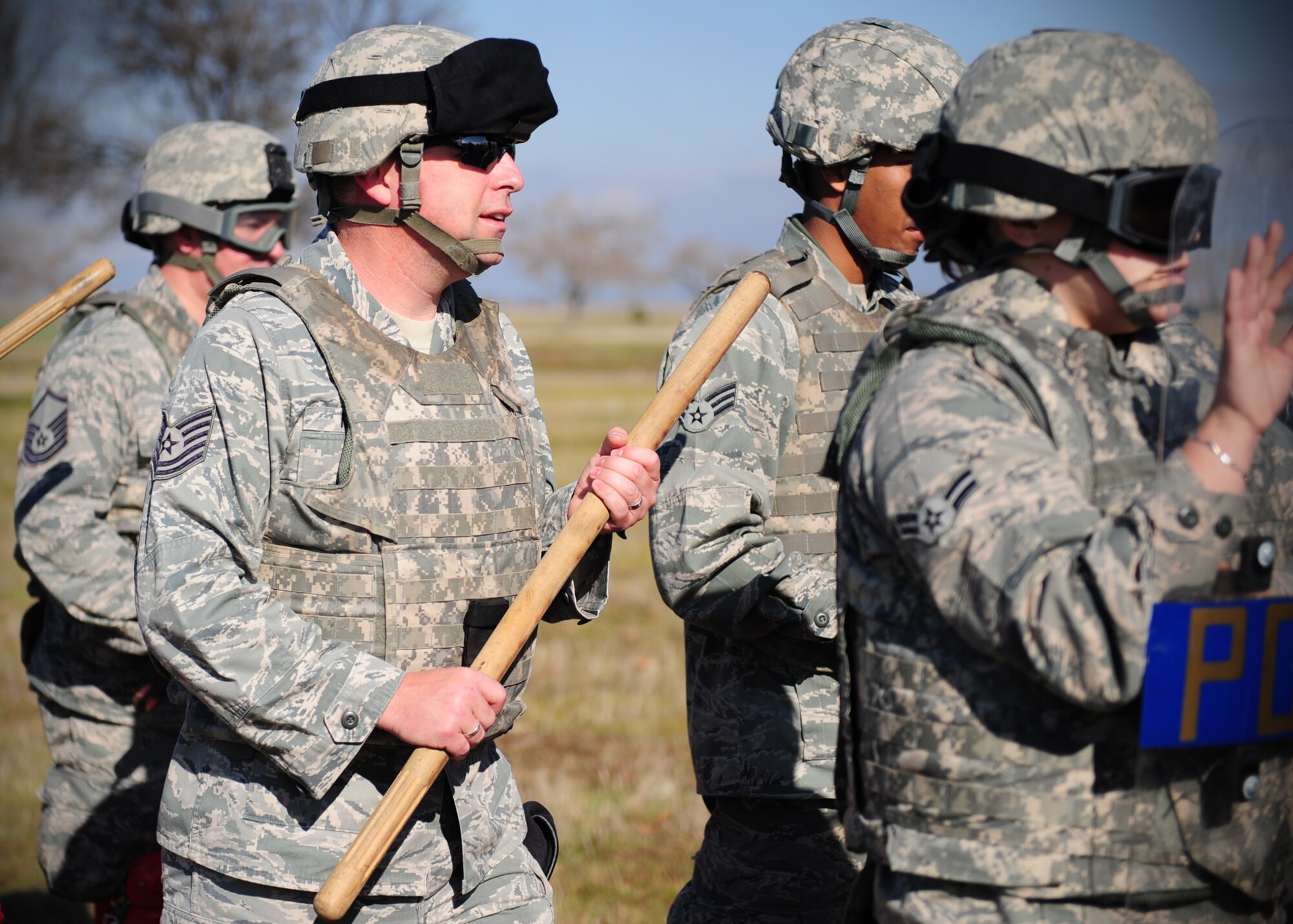 Tech. Sgt. Ian Marsh, 9th Security Forces Bravo Flight Squadron assistant flight chief, stands ready to break through simulated riot lines during training at Beale Air Force Base, Calif., Jan. 25, 2013. The squadron trains constantly to stay proficient in base defense. (U.S. Air Force photo by Senior Airman Shawn Nickel/Released)