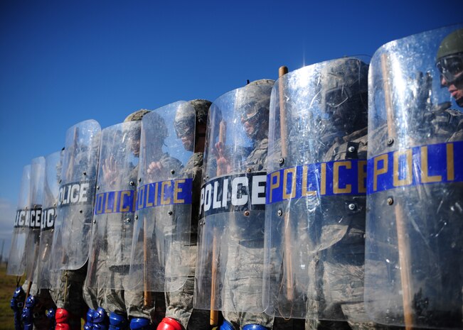 The 9th Security Forces Squadron Bravo Flight stands at the ready during civil disturbance training at Beale Air Force Base, Calif., Jan. 25, 2013. The squadron trains constantly to stay proficient in base defense. (U.S. Air Force photo by Senior Airman Shawn Nickel/Released)