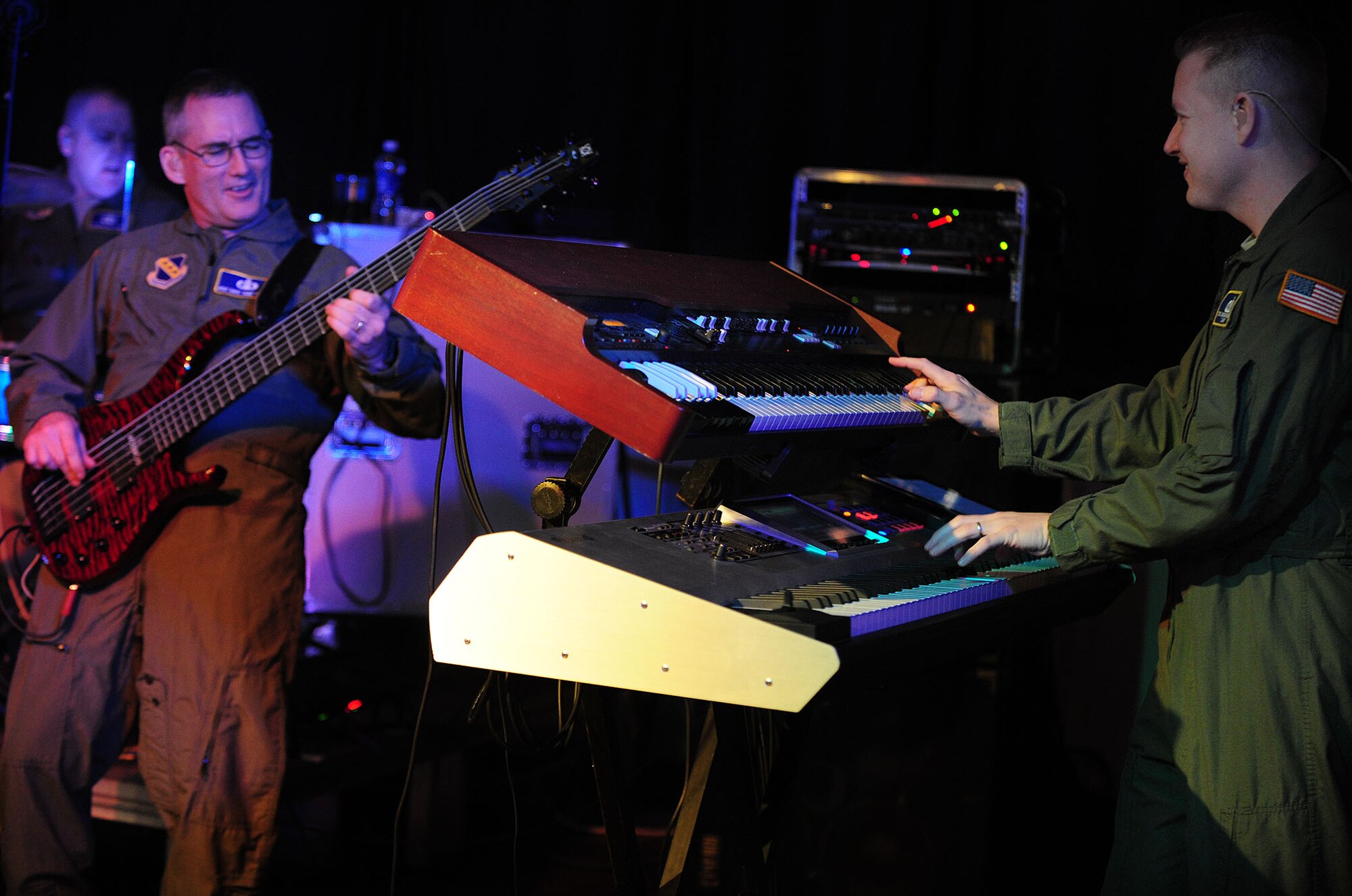 Max Impact, the Air Force’s premier rock band, performs at Cannon Air Force Base, N.M., Jan. 26, 2013. Max Impact travels to Air Force bases and deployed locations all over the world, showcasing the Air Force’s excellence through their music. (U.S. Air Force photo/Airman 1st Class Ericka Engblom)