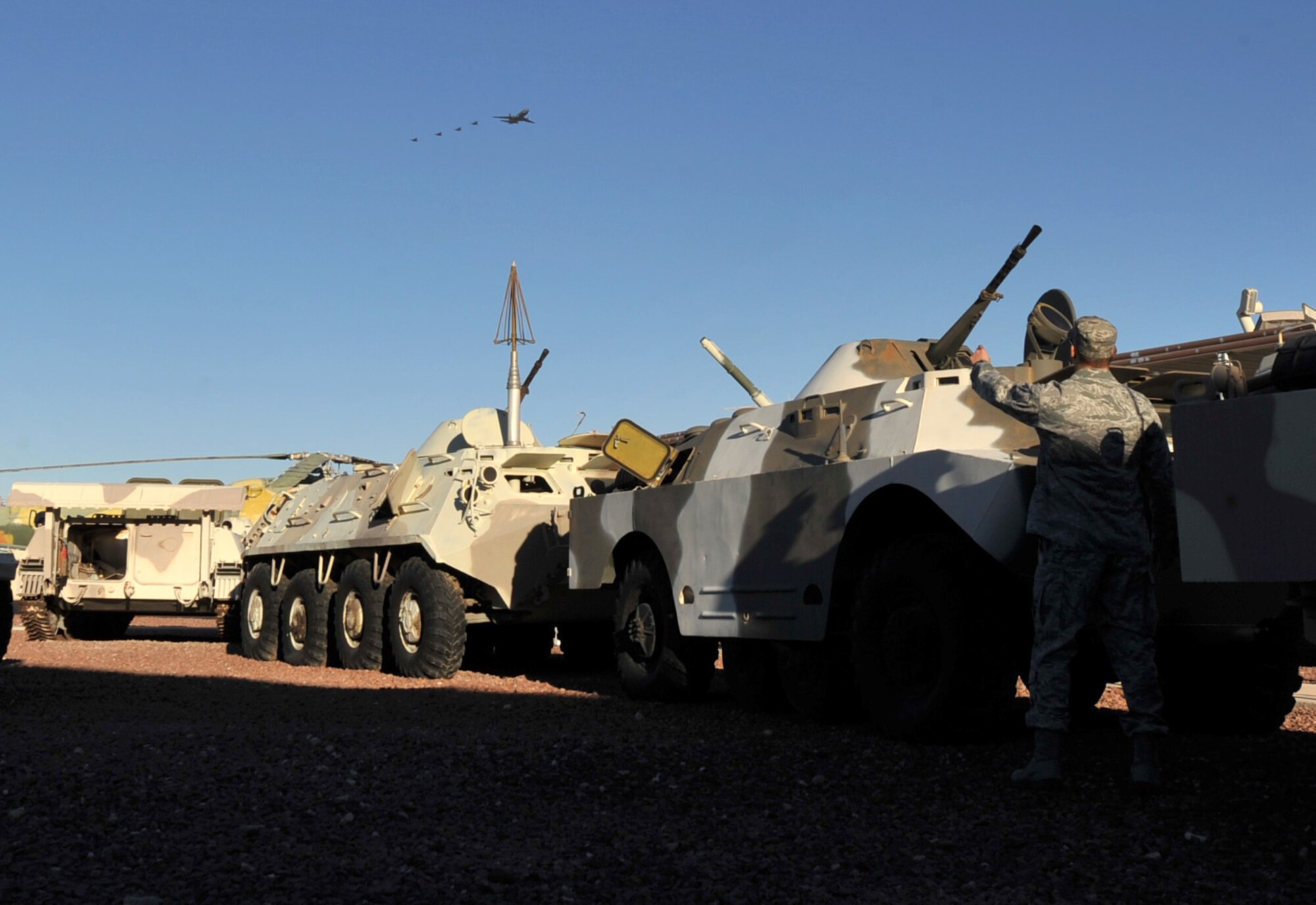 U.S. Air Force Capt. Dean Smith, 366th Operations Support Squadron intelligence flight commander, points out a group of aircraft during exercise Red Flag 13-2, at Nellis Air Force Base, Nev., Jan. 22, 2013. Red Flag is a realistic combat training exercise involving the air forces of the United States and its allies. (U.S. Air Force photo/Senior Airman Heather Hayward) 