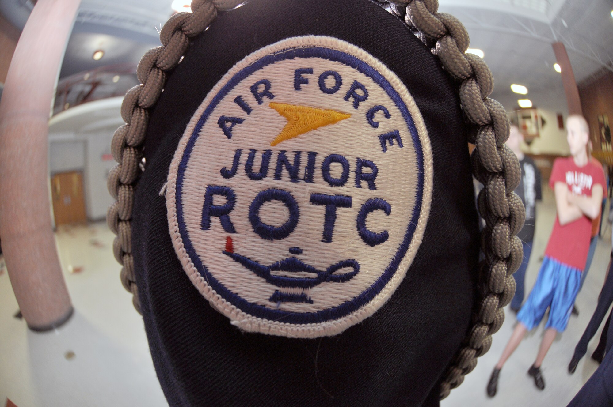 A student with the Lee's Summit North High School Junior Officers' Training Corps stands at attention Jan. 24, 2013. Staff Sgt. Travis Lewis, 509th Bomb Wing Honor Guard assistant noncommisssioned officer in charge, travels there several times a week to help train the school's AFJROTC program in drill and ceremony. Lewis is a traditional reservist with the 442nd Aircraft Maintenance Squadron, which is part of the 442nd Fighter Wing, an A-10 Thunderbolt II Air Force Reserve unit at Whiteman Air Force Base, Mo. (U.S. Air Force photo by Senior Airman Wesley Wright/released) 
 
