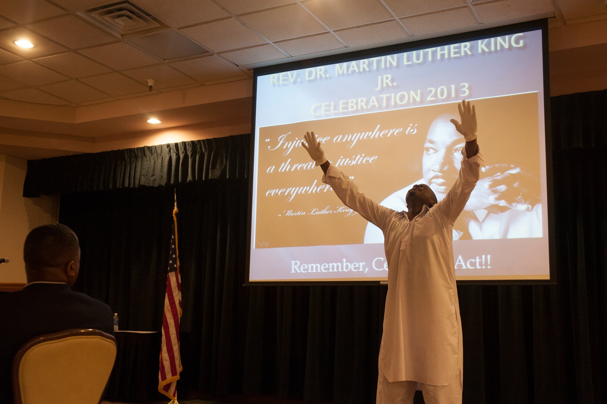 A member of the Yahweh praise team dances during the Martin Luther King Jr. observance luncheon held at Cannon Air Force Base, N.M., Jan. 23, 2012. The luncheon was held to recognize past hardships and prejudices that King faced during his fight for freedom as a civil rights activist. (U.S. Air Force photo/Airman 1st Class Xavier Lockley)