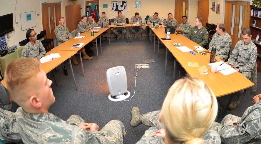 Senior NCOs and future SNCOs sit in on an Airman panel Jan. 24, 2013, at the Professional Development Center, at RAF Mildenhall, England. Five Airmen from various squadrons on base volunteered to take part in the panel where they were asked to speak about the issues that concern them most and advise the senior enlisted Airmen on how to more effectively lead their peers. (U.S. Air Force photo by Senior Airmen Jerilyn Quintanilla/Released)