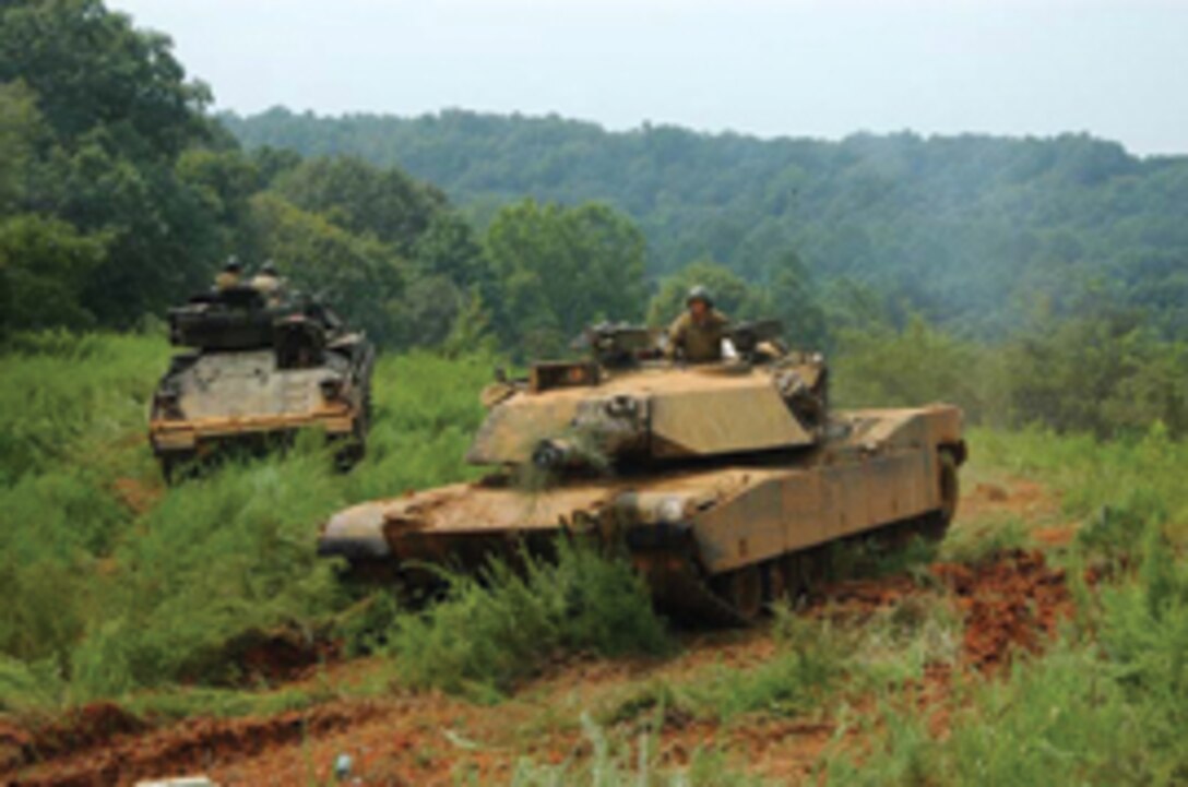 Armored training maneuvers at Fort Benning, Ga. In an effort to consolidate resources, the U.S. Army recently moved their Armor School to Fort Benning.
