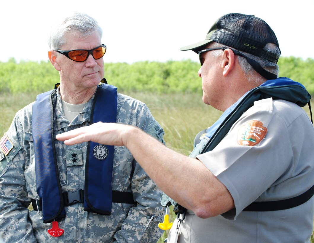 During an airboat ride through the Everglades, Dan Kimball, superintendant of Everglades National Park, discusses Everglades restoration efforts with Maj. Gen. Michael J. Walsh, Deputy Commanding General for Civil and Emergency Operations for the U.S. Army Corps of Engineers, during his visit to south Florida Jan. 23.              
