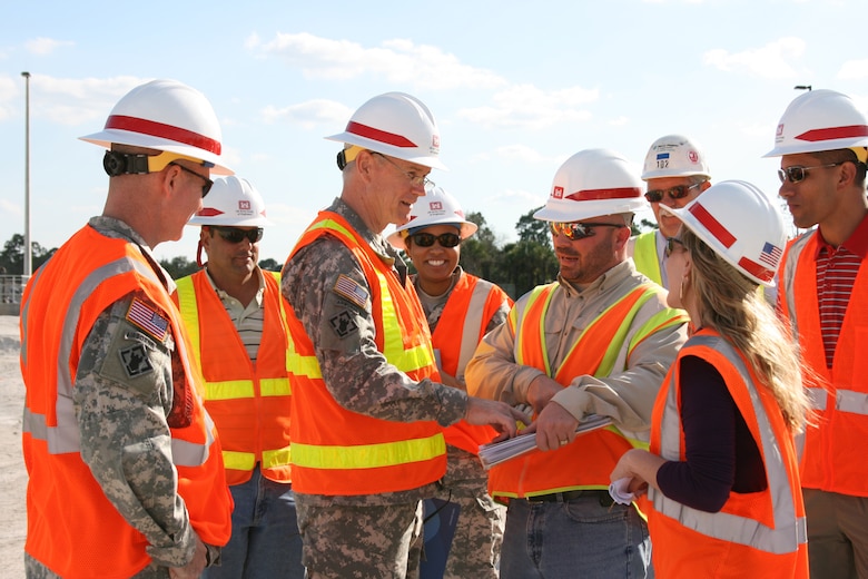 During a Jan. 23 site visit to the Picayune Strand Restoration Project, Jacksonville District resident engineer Mike Miller and Project Manager Lacy Shaw provide an overview of the project to Maj. Gen. Michael J. Walsh, Deputy Commanding General for Civil and Emergency Operations for USACE. Also in attendance was (from left) Jacksonville District Commander Col. Alan Dodd, Jacksonville District construction representative Michael Sterrett, Executive Officer to the Deputy Commanding General Maj. Robin N. Scott, Harry Pepper and Associates General Superintendent Glen Wight and Jacksonville District Ecosystem Branch Chief Howie Gonzales.                         