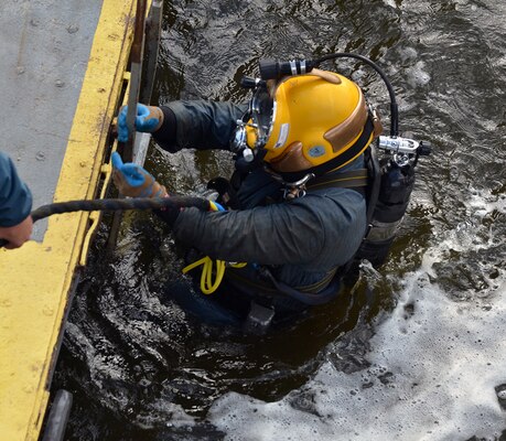 MINNESOTA CITY, Minn.—Nate Van Loon, U.S. Army Corps of Engineers, St. Paul District, diver, conducts periodic inspections at Lock and Dam No. 5 on the Mississippi River near Minnesota City, Minn., Sept. 18. The Corps’ divers work in very low visibility and feel their way around the entire structure. The inspections are a part of the Corps’ effort to maintain the 9-foot navigation channel at the 13 locks and dams within the district’s boundaries. Keeping this system open is vital to the nation’s economy.  In 2010, 16.2 million tons of commodities were shipped on the Mississippi River within the St Paul District’s area of operation, including 8 million tons of grain grown in the Upper Midwest. The industries making these shipments saved nearly $384 million by using the inland waterways instead of overland shipping methods.