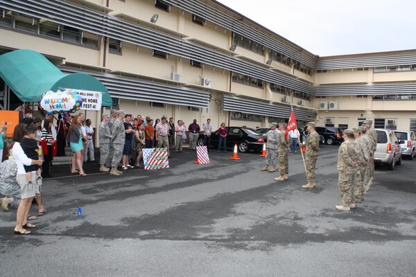 Honolulu District family members and District co-workers welcomed home the 565th Engineer Detachment Forward Engineer Support Team-Advance (FEST-A) from their nine-month deployment to Afghanistan Jan. 24 in front of District headquarters at Fort Shafter. At the redeployment ceremony Pacific Ocean Division Commander Col. Gregory J. Gunter praised the detachment's spirit of volunteerism.