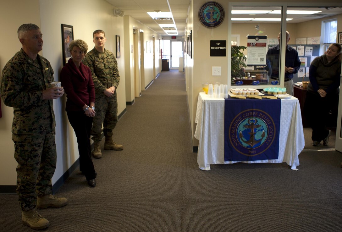 Marine Corps Installations East - Marine Corps Base Camp Lejeunes’ executive officer, Col. Darrel Thacker, congratulates and wishes Navy Marine Corps Relief Society a happy 109th birthday aboard MCB Camp Lejeune Jan. 23.  During 2011 NMCRS disbursed more than $48 million in interest-free loans and grants to Marines and sailors in need.  The society thrives through the support from selfless and dedicated volunteers. 