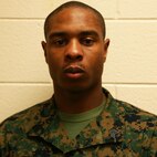 Sgt. Cornelius D. Davis, a Chicago native and ammunition technician with Ammunition Company, 2nd Supply Battalion, 2nd Marine Logistics Group, poses for a photo aboard Camp Lejeune, N.C., Jan. 25, 2013. Davis said his passion for leadership found a home in the Marine Corps, where he received the opportunity to lead and mentor Marines. 